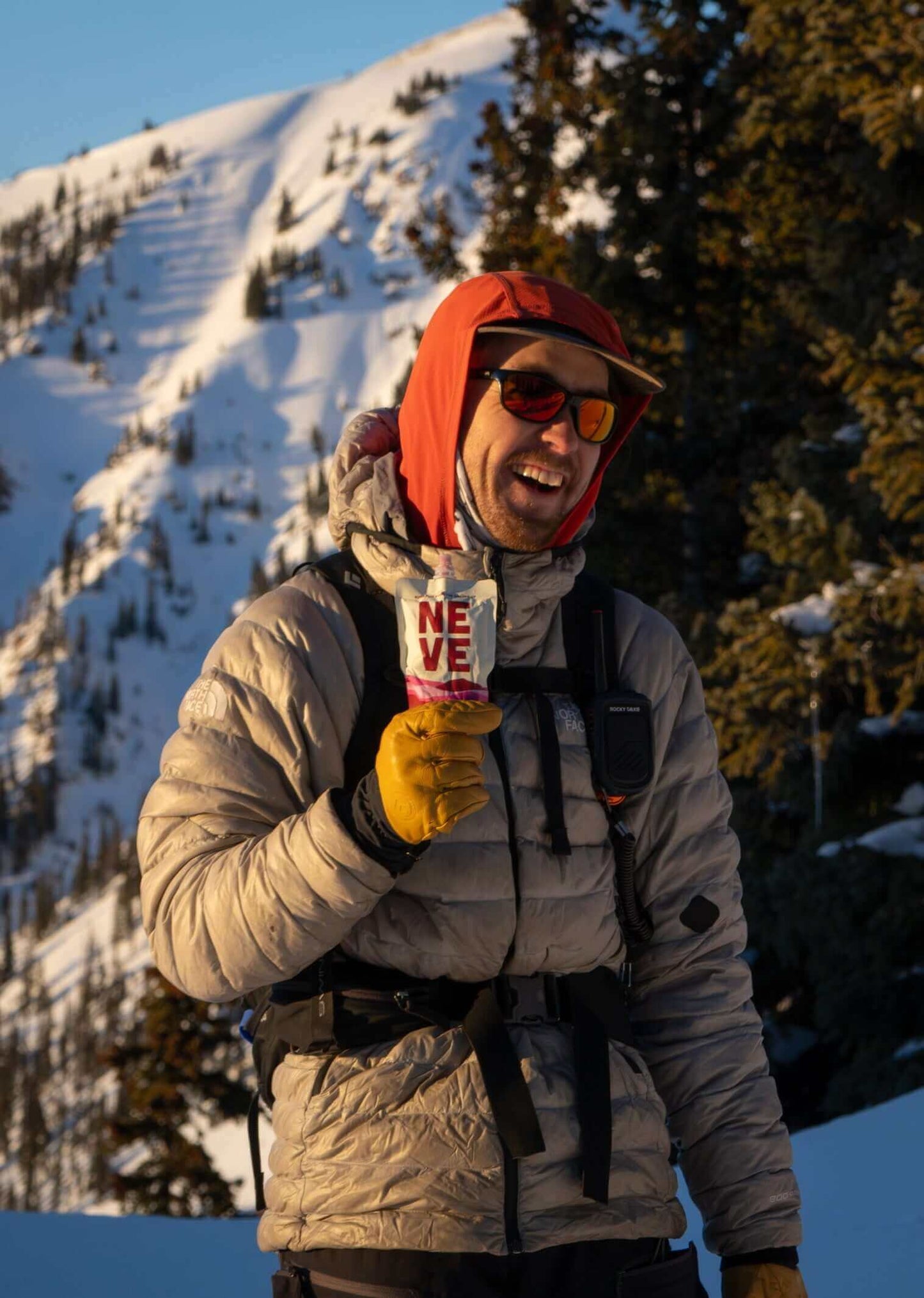 Vail backcountry skier uses Boysenberry Beet Neve smoothie pouch for backcountry skiing adventure
