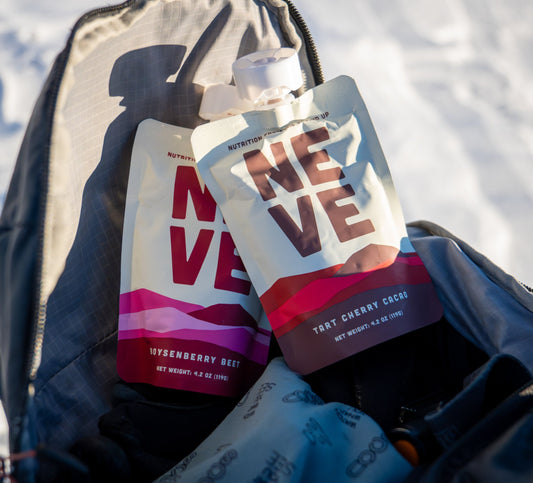 Two Neve smoothie pouches in an athletes backpack as alternatives to energy bars