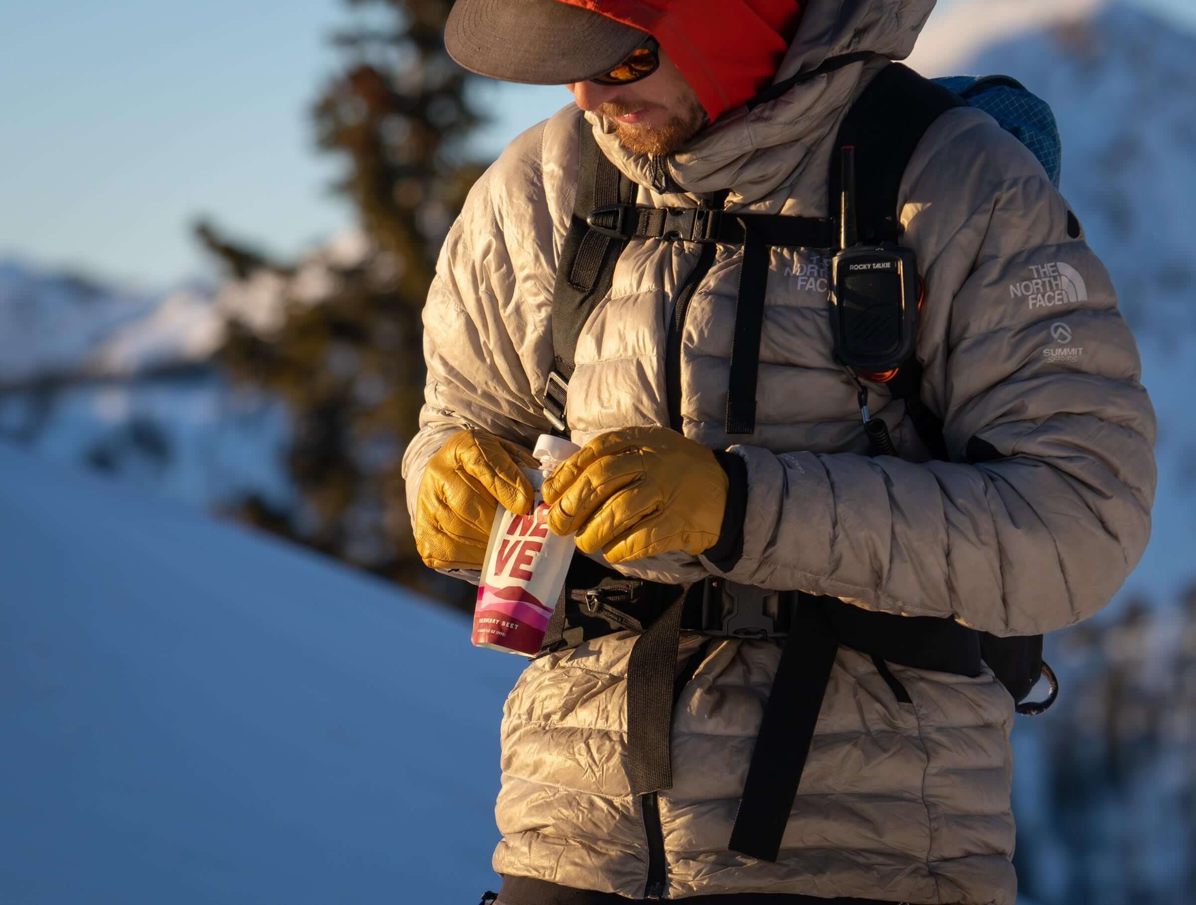 Hayes in the backcountry opening Boysenberry Beet Smoothie Pouch