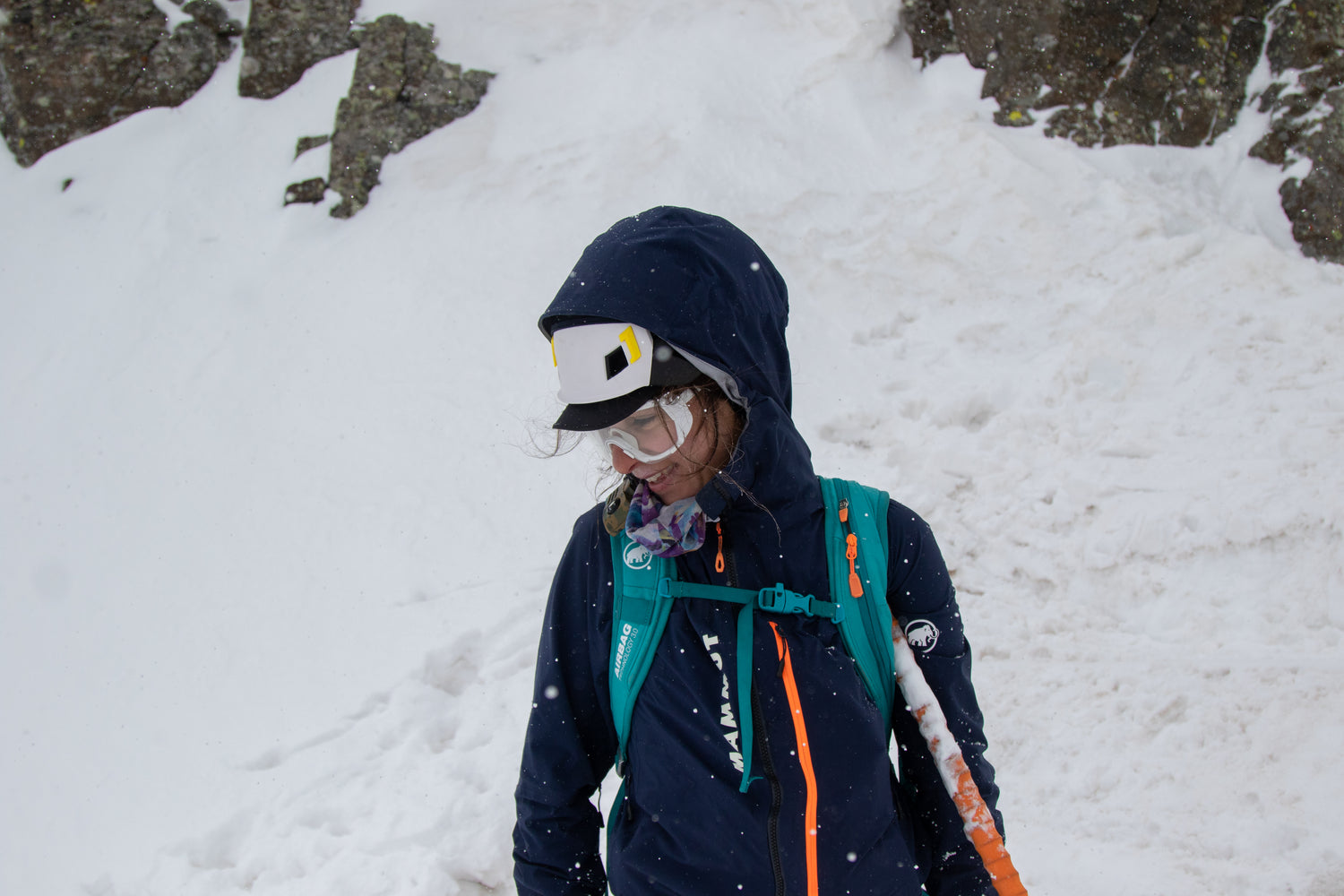 Neve Foods founder Nora Fierman skiing in the backcountry in the San Juan mountains of Colorado, embodying the spirit of adventure and the brand’s commitment to plant-based nutrition.