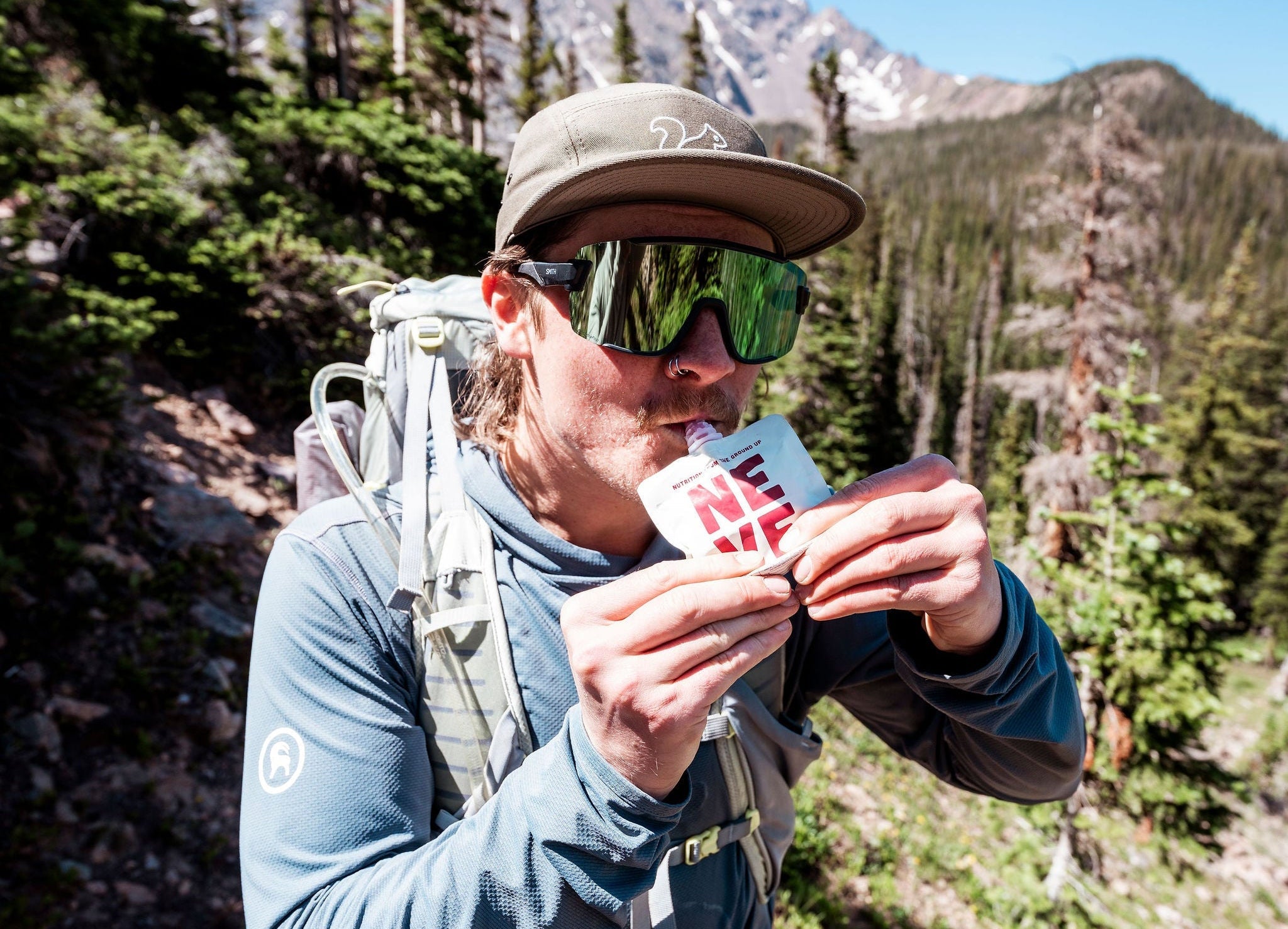 Hiker uses Neve BoysenberryBeet