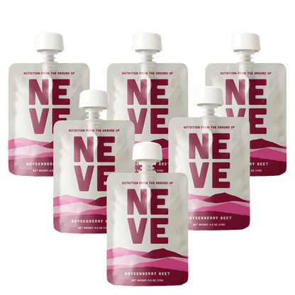 Six Neve Boysenberry Beet smoothie pouches arranged in a scattered pattern on a transparent background.