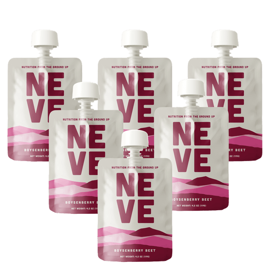 Six Neve Boysenberry Beet smoothie pouches arranged in a scattered pattern on a transparent background.